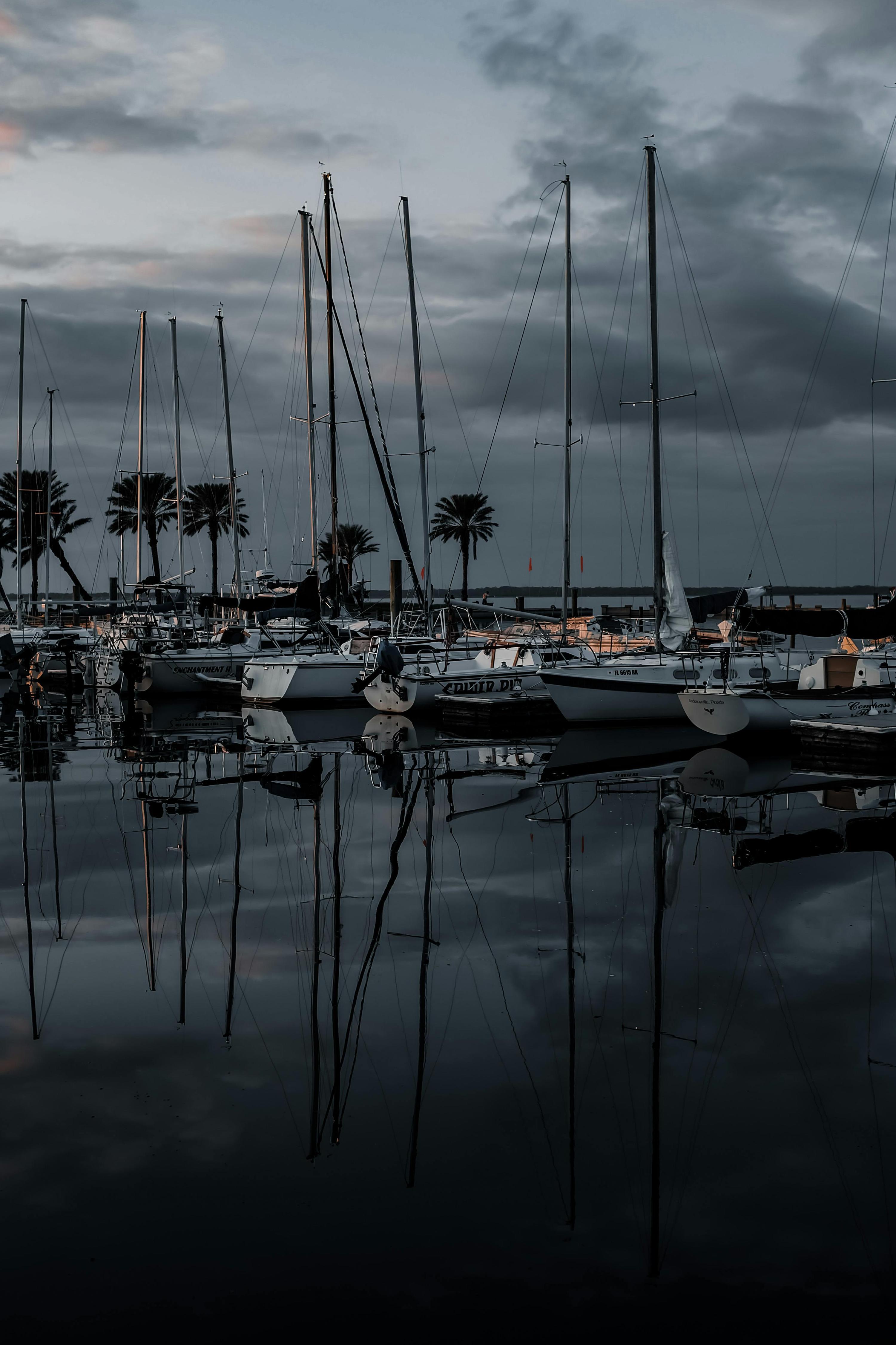 Yachts docked at the Sanford marina on Lake Monroe at dusk in Sanford, the county seat of Seminole County, Florida